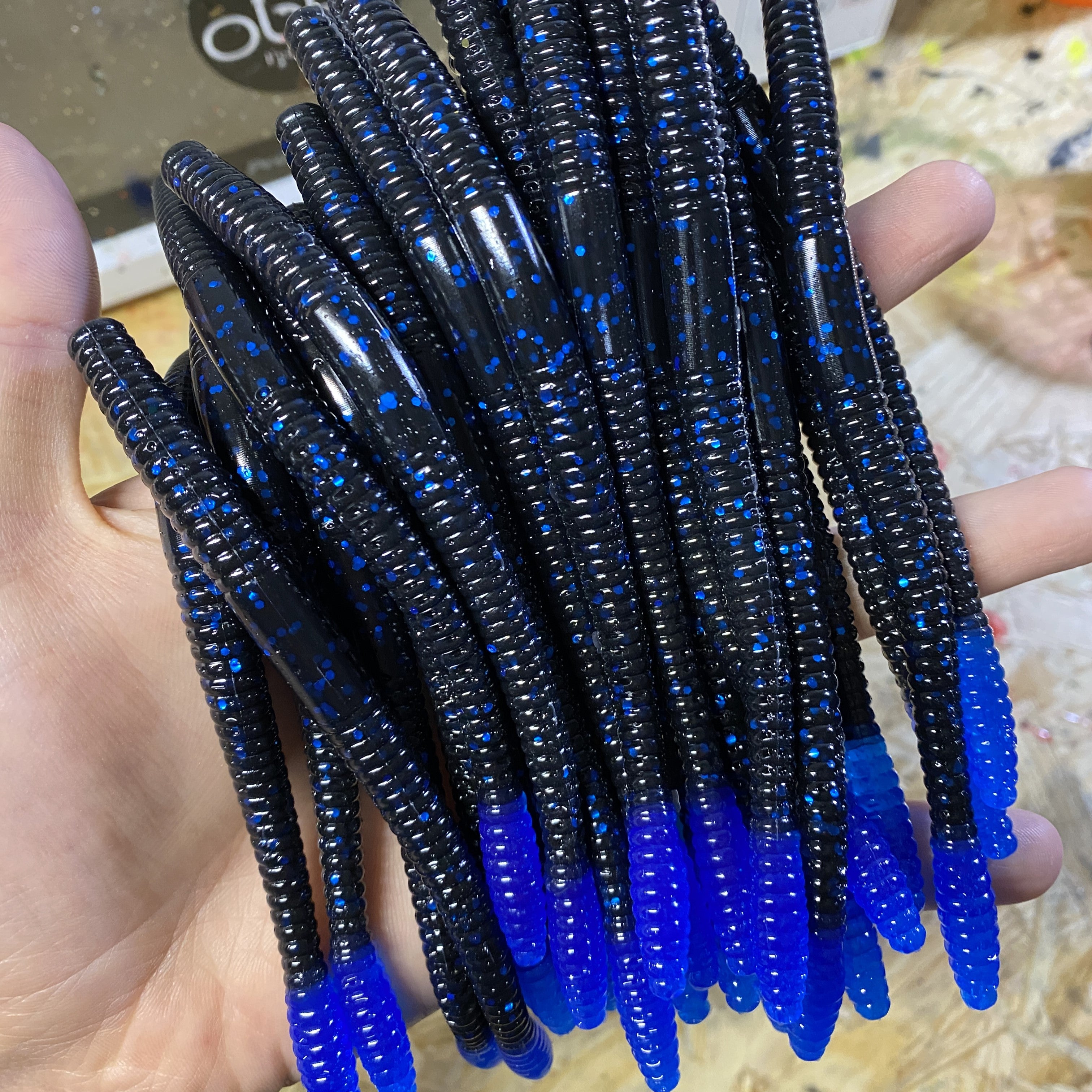 black with blue flake and blue tail 6" finesse worm