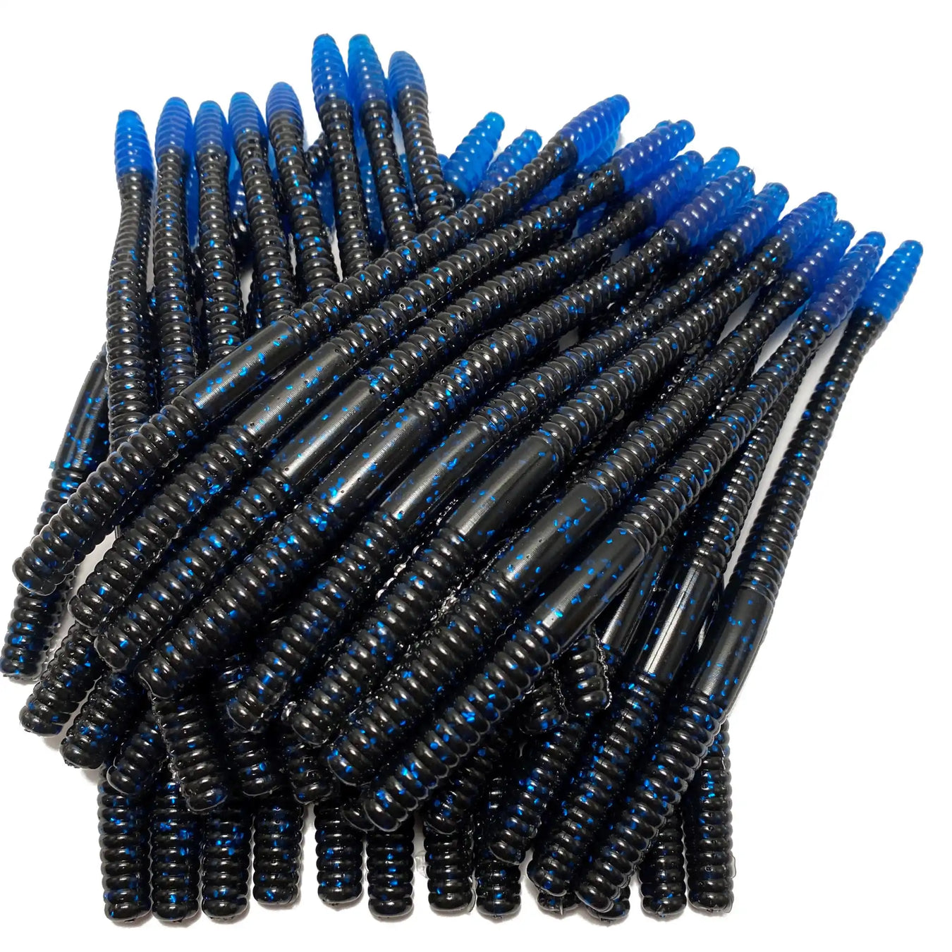 Black and blue plastic fishing worms arranged in a cluster.