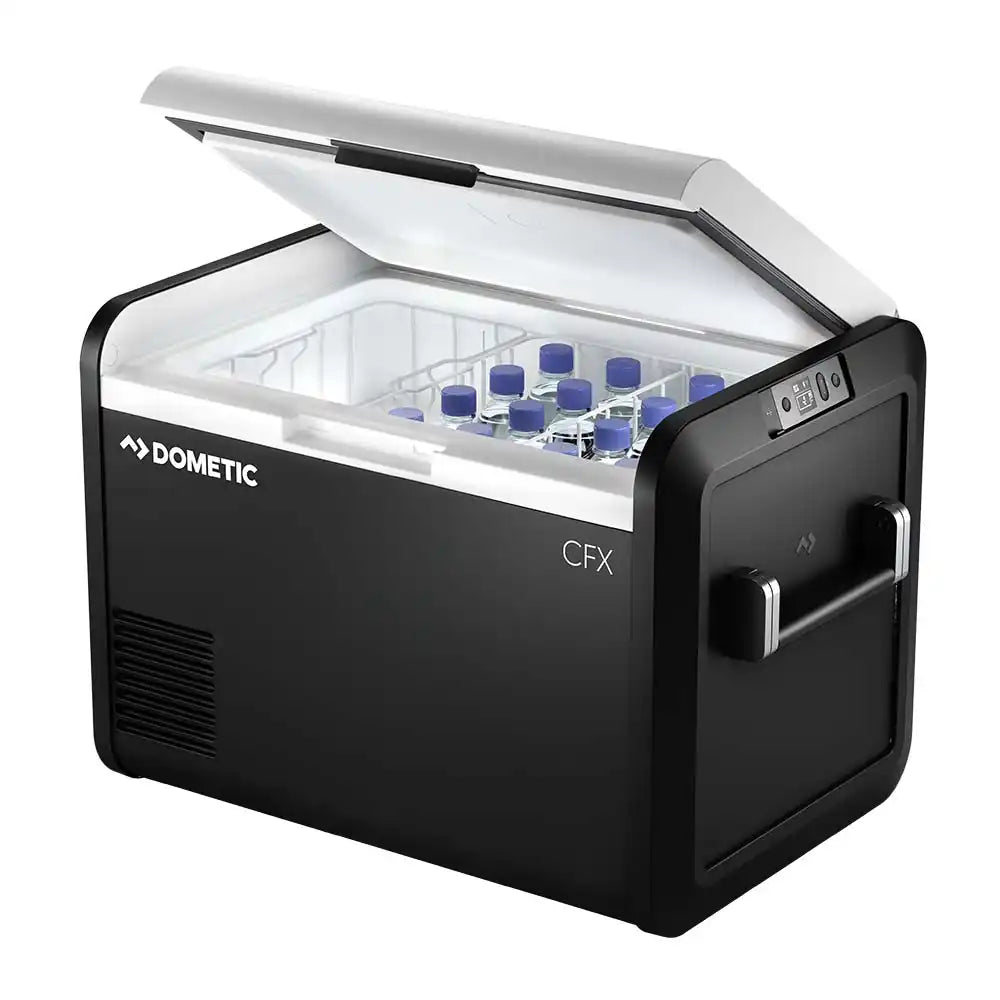 Dometic CFX portable electric cooler with an open lid showing blue containers inside.